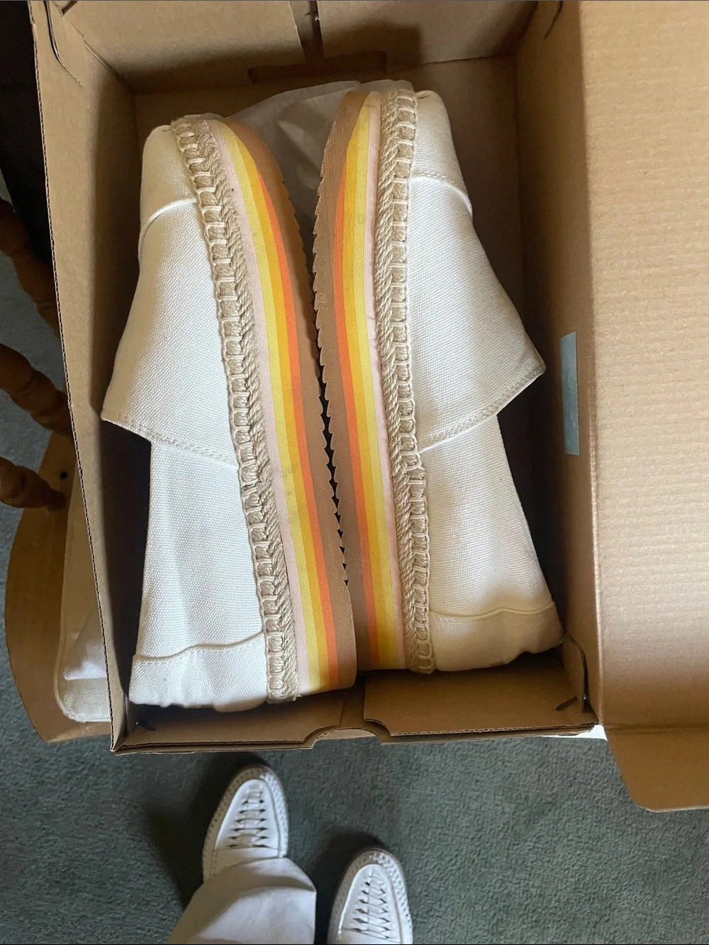 TOMS Kids Cream Canvas Slip-On with Yellow & Orange Striped Sole
